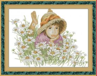 Little girl in a field of flowers.